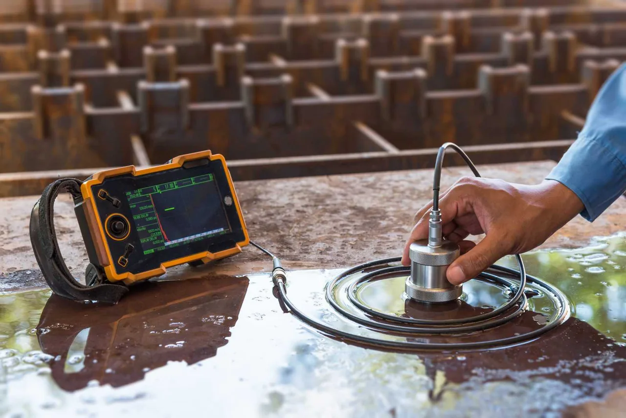 Technician carrying out a non-destructive inspection